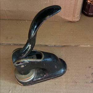 Vintage Black Embosser Merit Corporation